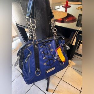 Nicole Lee genuine leather bag.